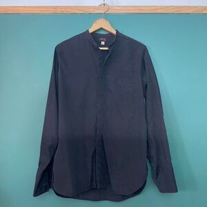 Vintage 1950s long sleeve button up shirt with a relaxed fit, banded collar